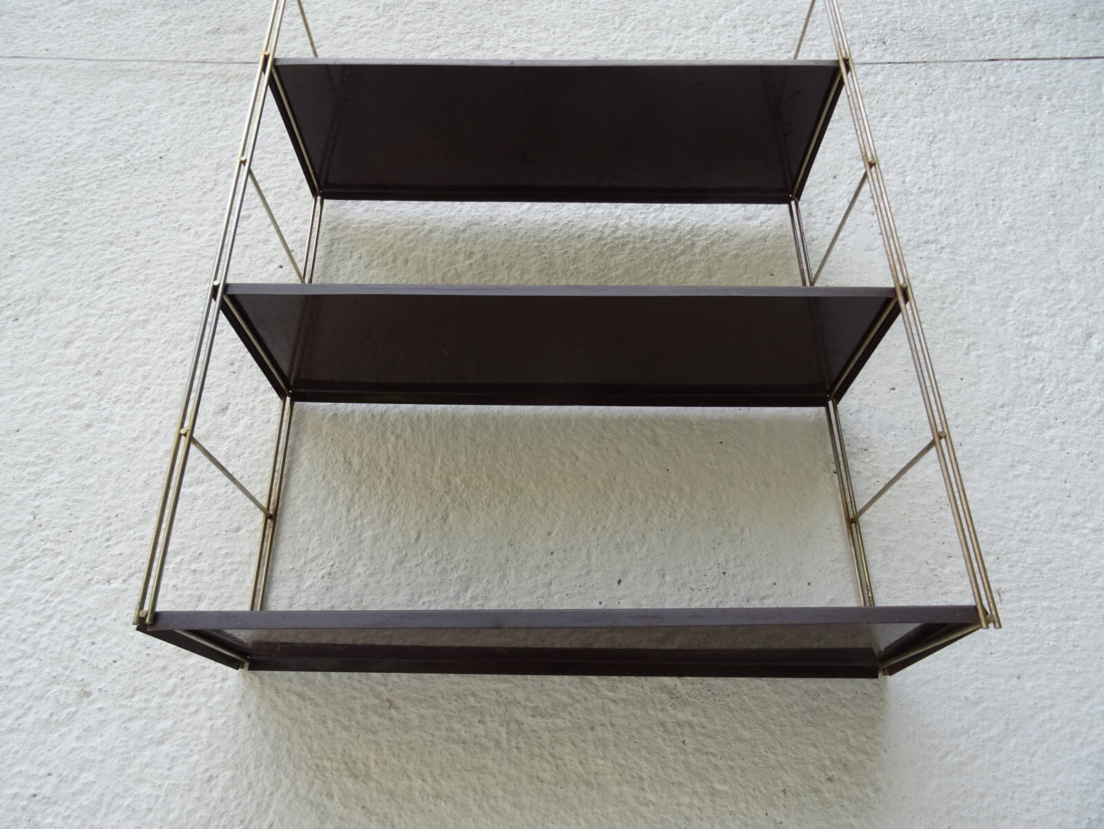Metal string modular wall shelf