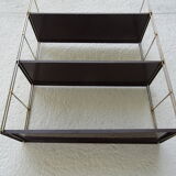 Metal string modular wall shelf