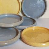 Seven vintage potter's sweet treat plates