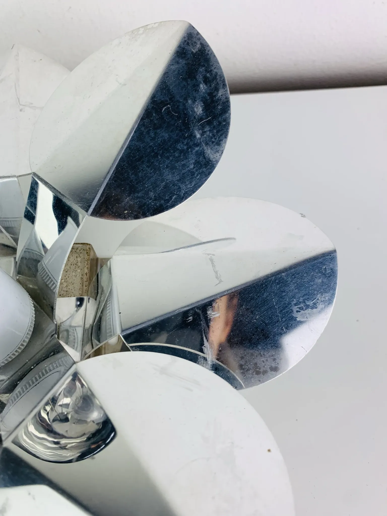 Space Age chrome flower wall light from the 1960s.