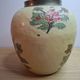 Vintage enamelled brass round vase with handmade floral decoration.