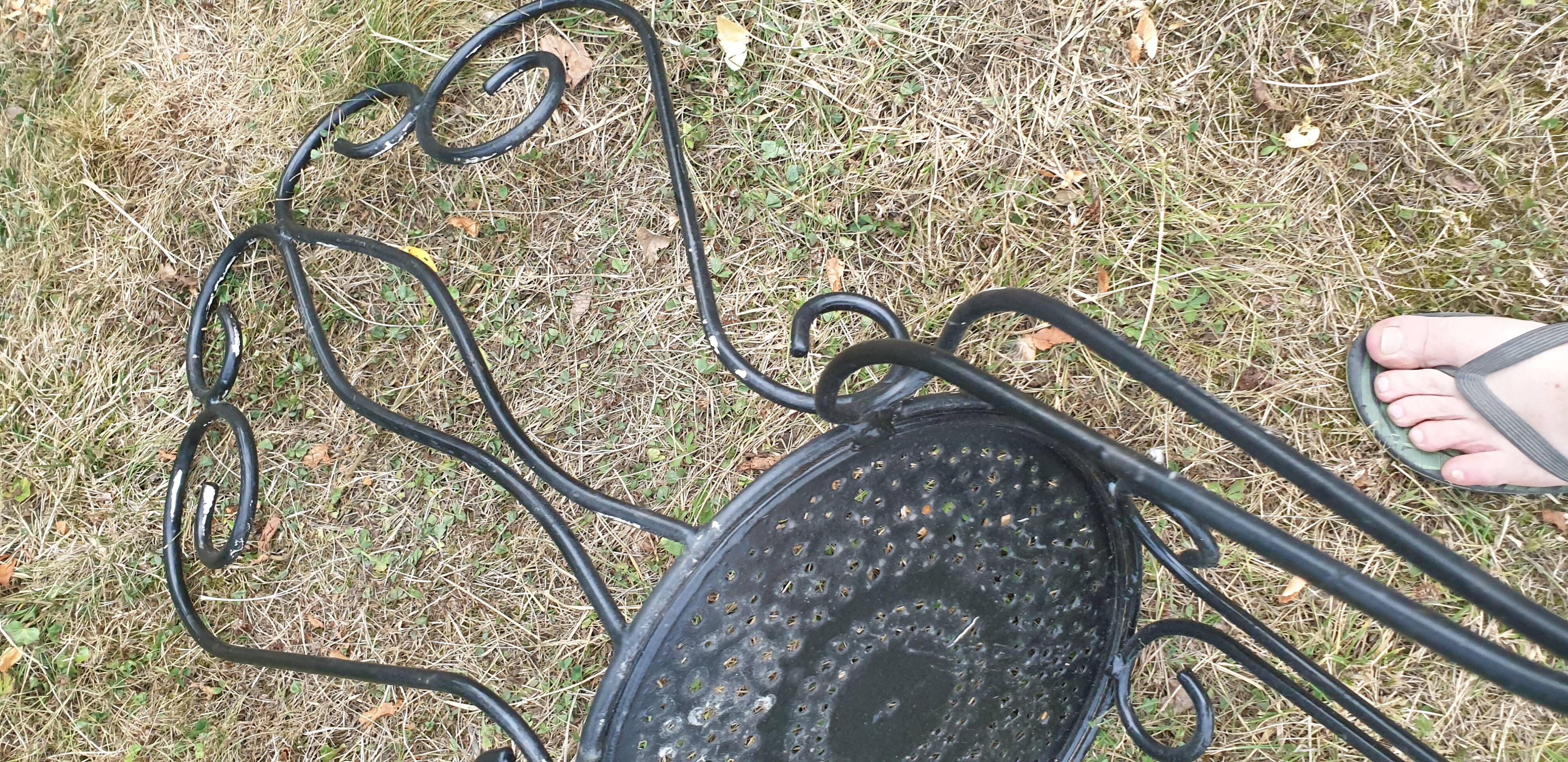 1 ornate wrought iron garden chair