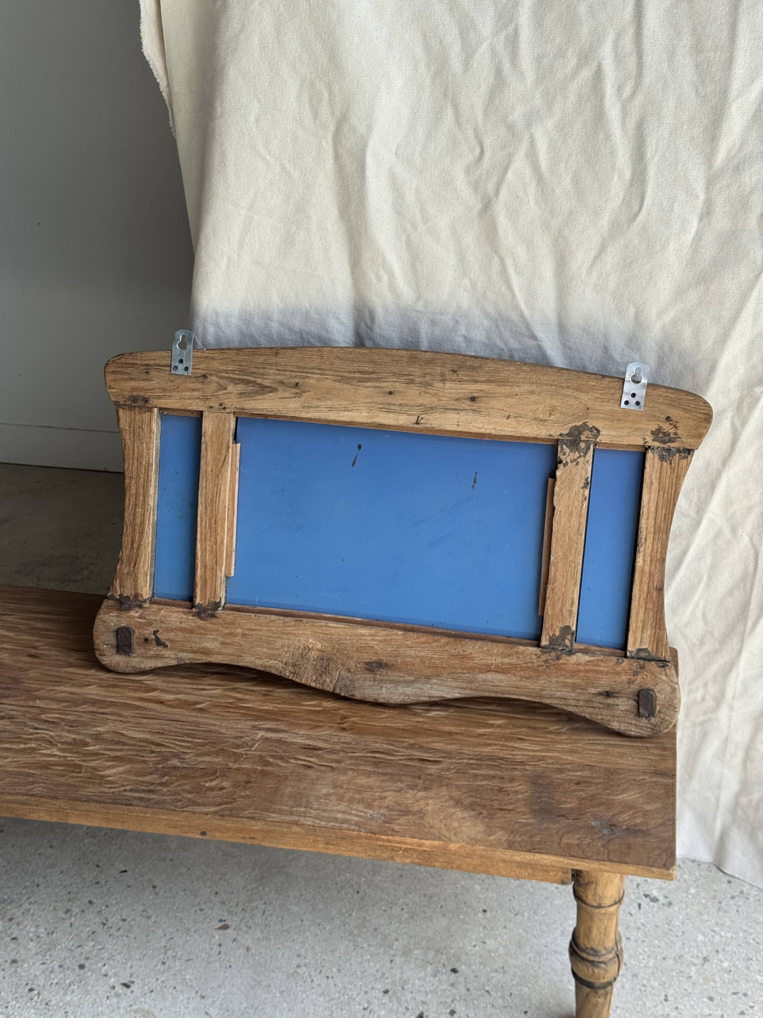 Small wall mirror in organic old Indonesian teak 75x45.