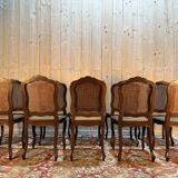Set of 10 Louis XV style chairs in walnut and cane.