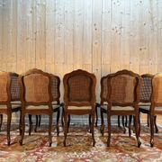 Set of 10 Louis XV style chairs in walnut and cane.
