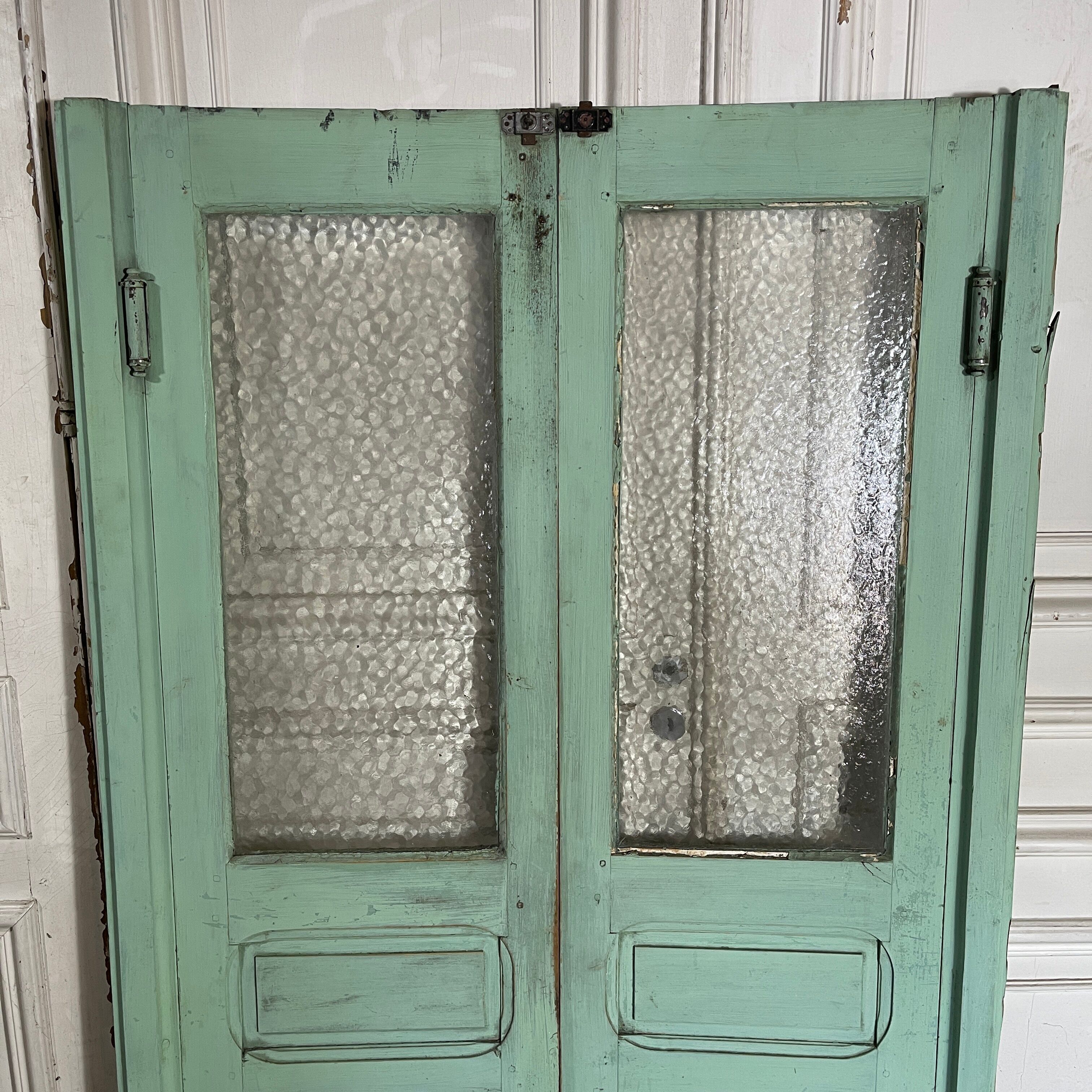 Old pair of saloon type glass doors