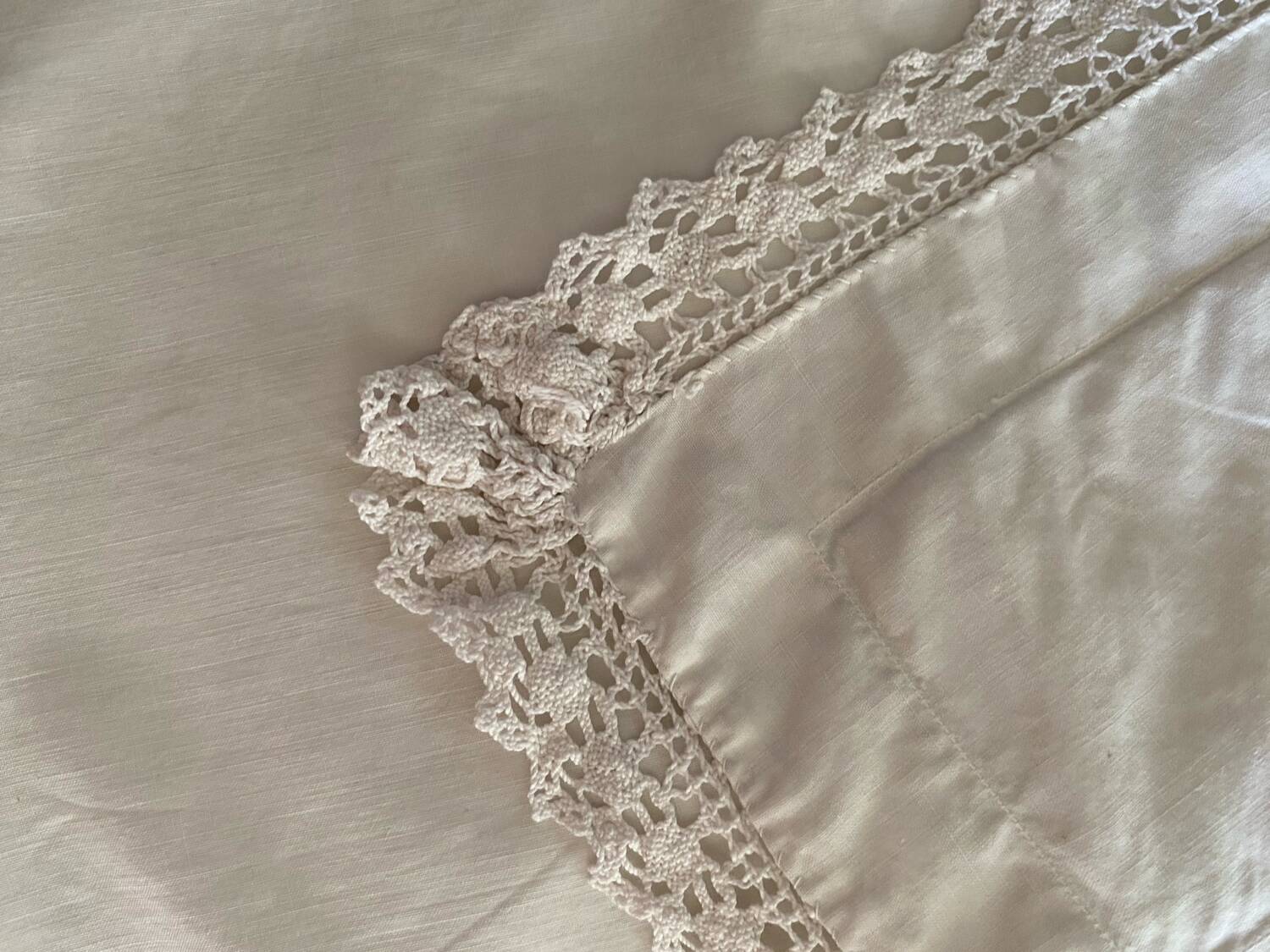 Old cotton and lace pillowcase.