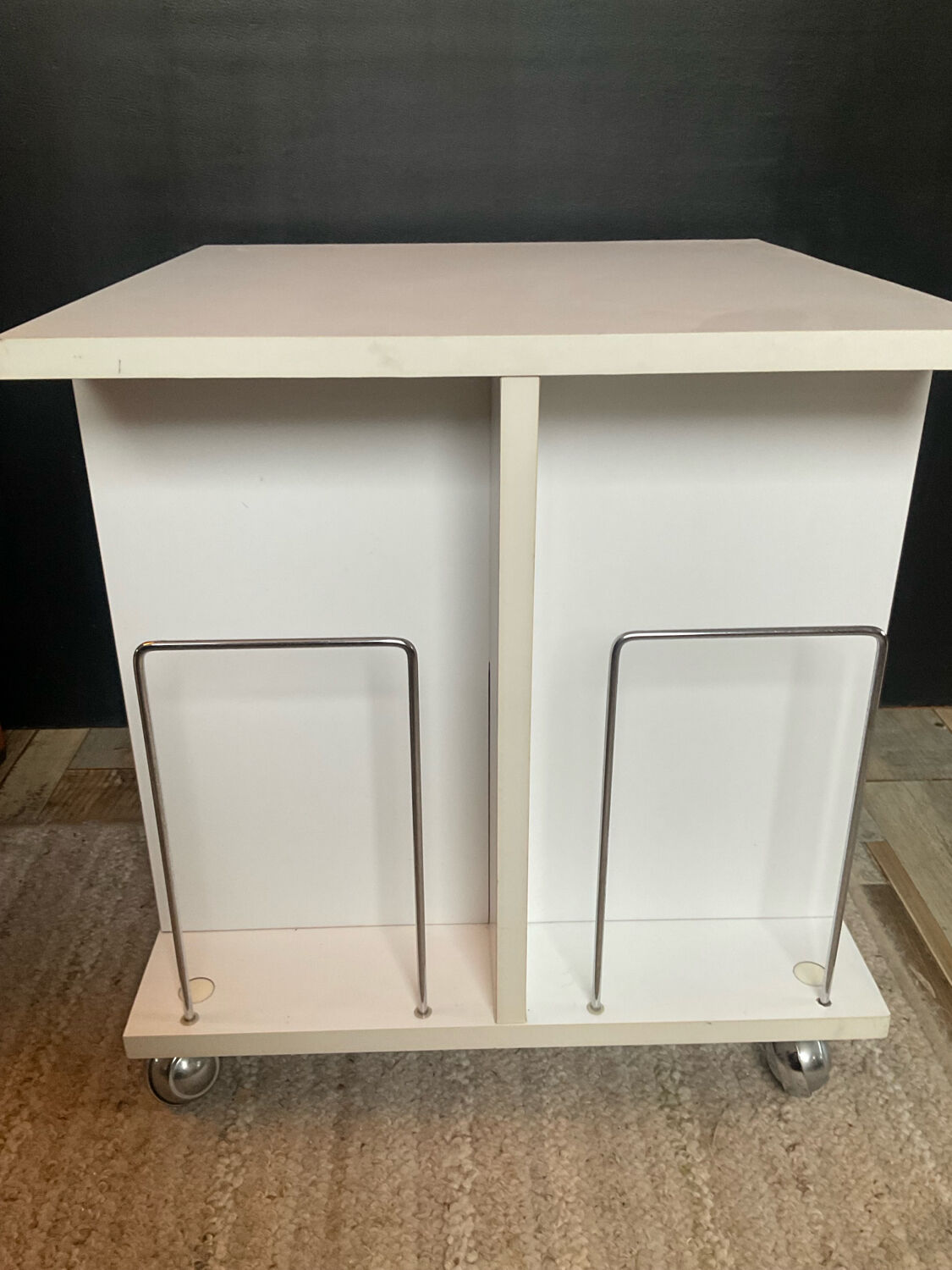 Small side table with storage for vinyl records from the 1970s.