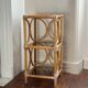 Rattan and glass shelf