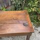 Old kitchen table with chopping board