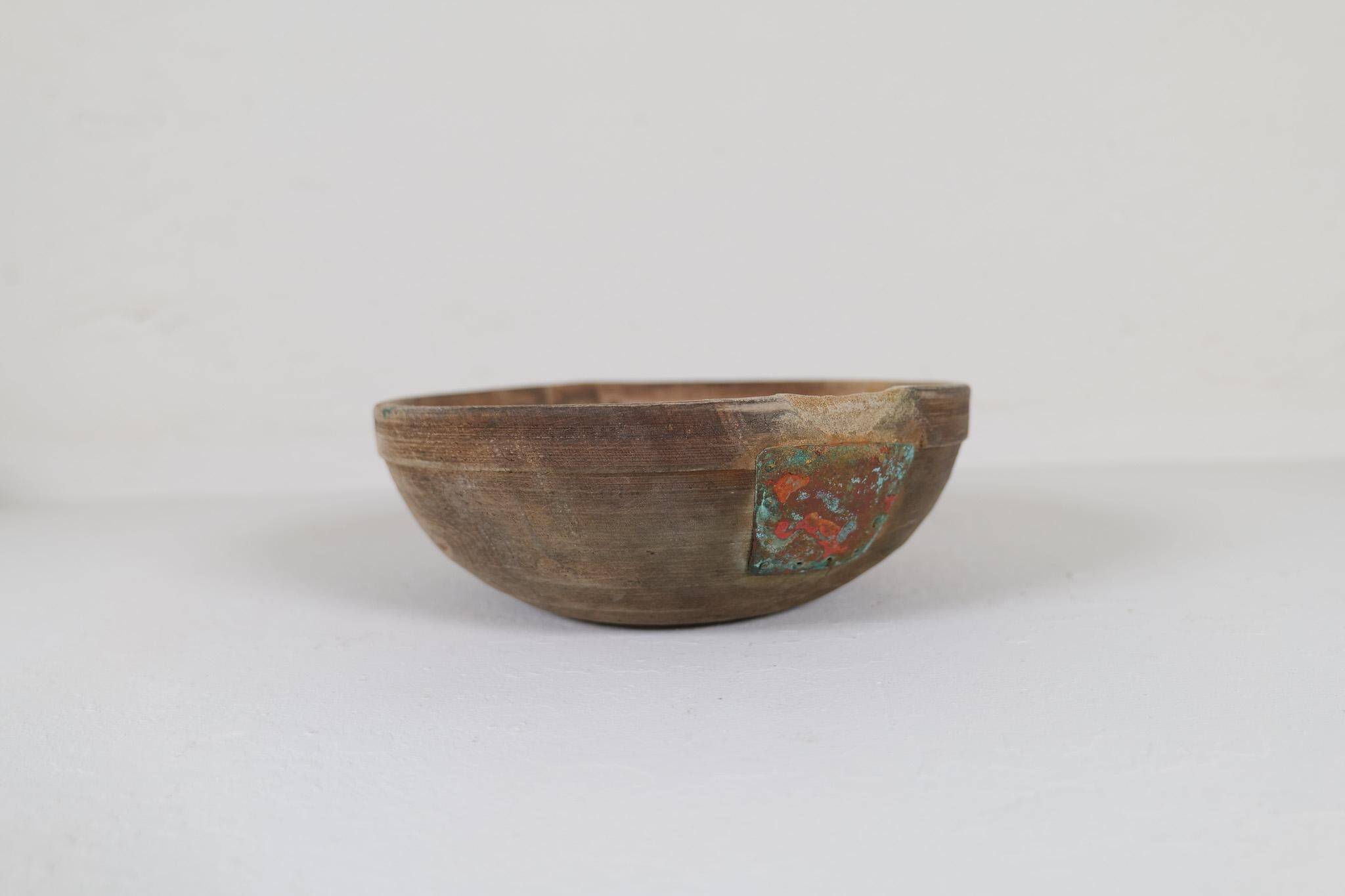 Set of three unique farmhouse bowls from 19th-century Swedish folk art.