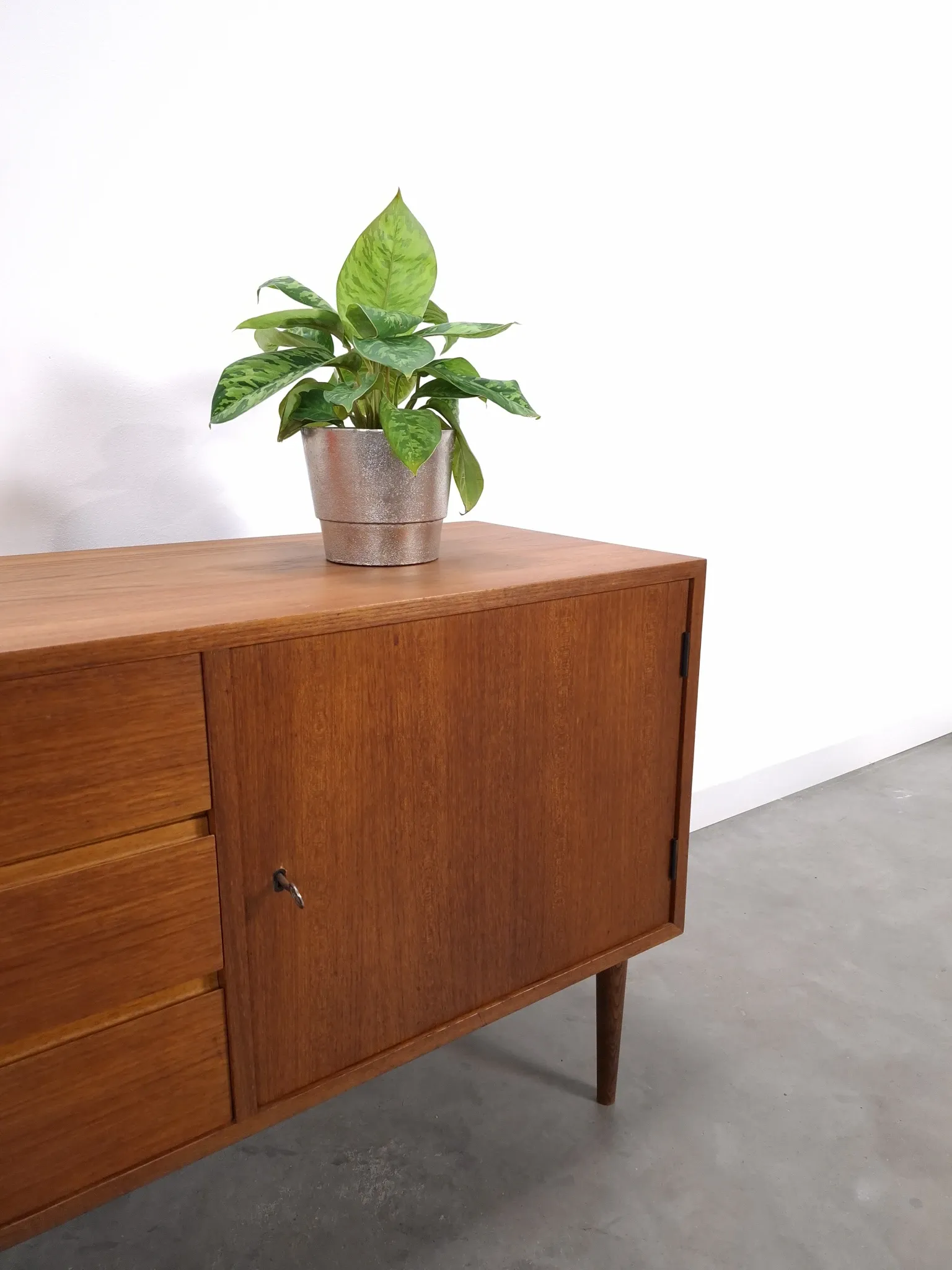 Vintage teak cabinet from the 1960s, sideboard with 3 drawers and a door.