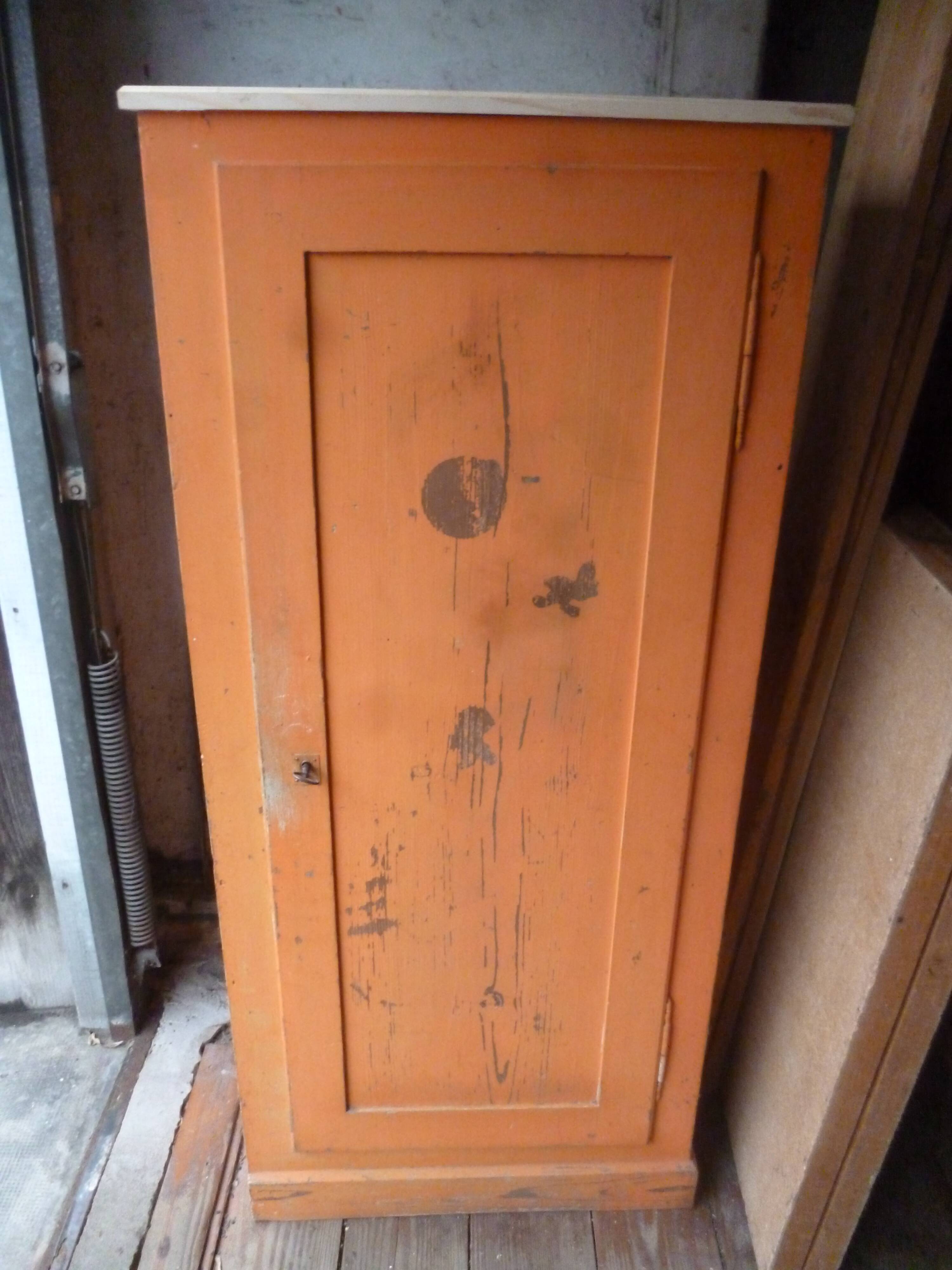 Small piece of furniture with orange patina