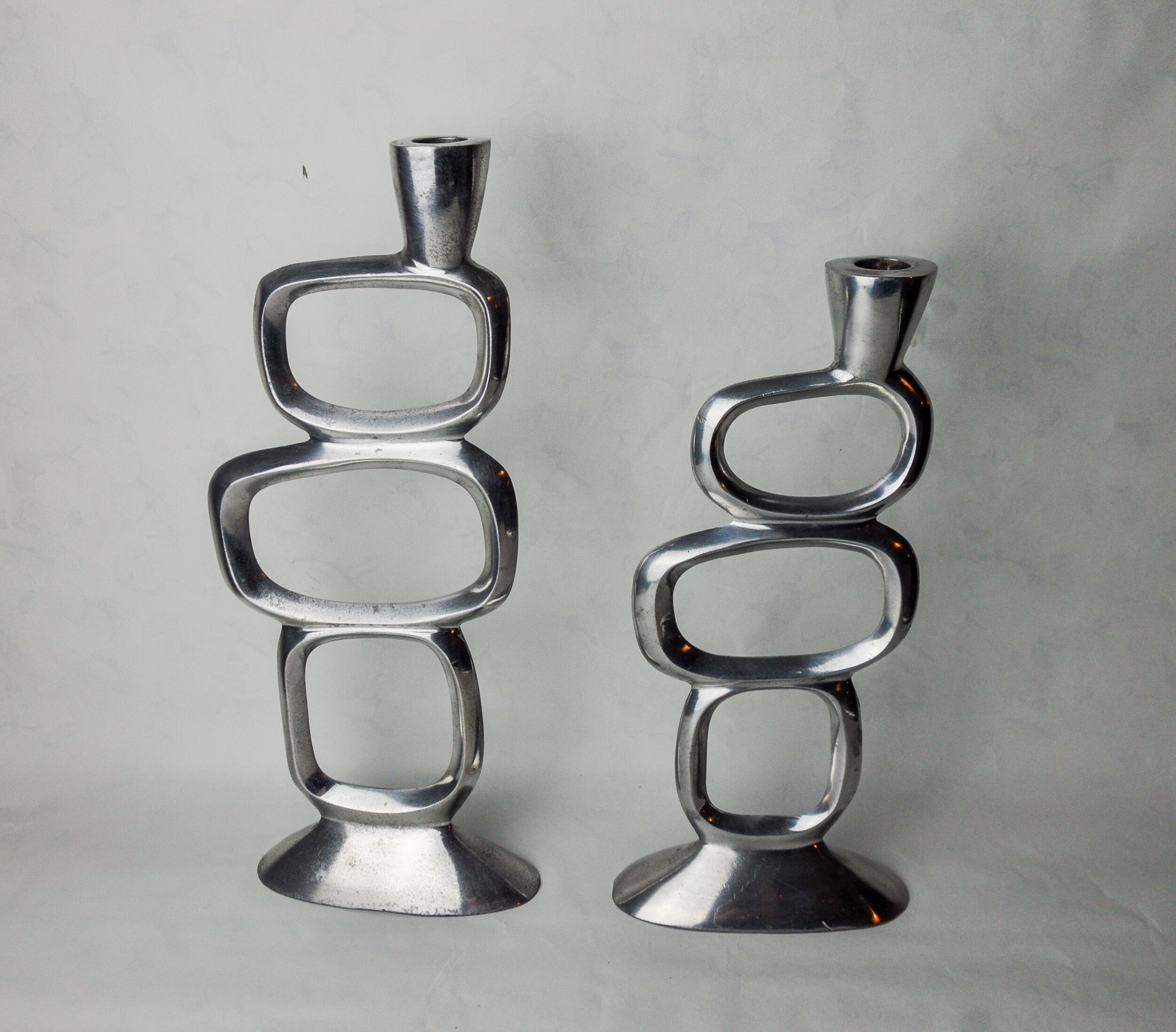 Pair of circle candlesticks by Matthew Hilton, England, 1980