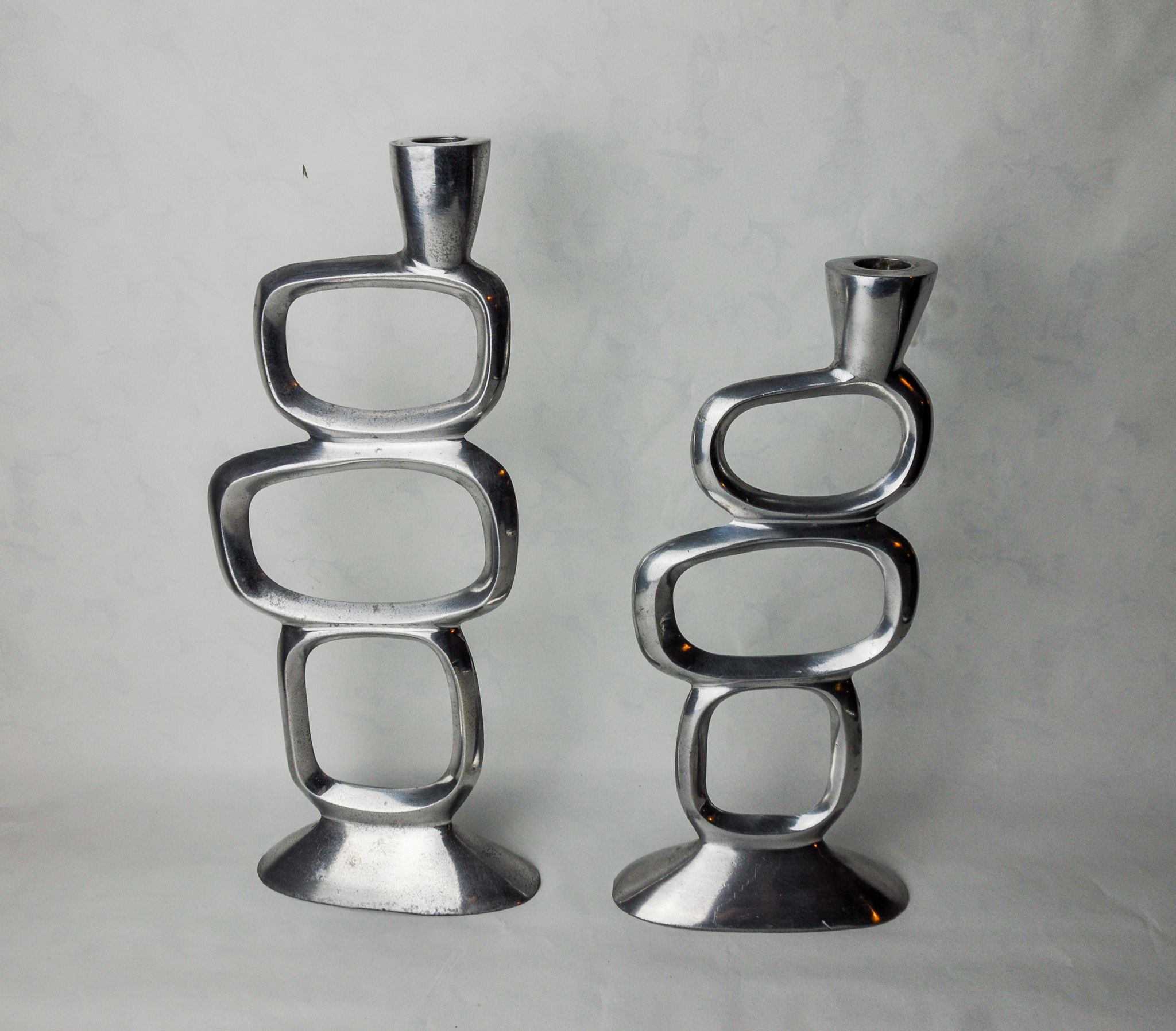 Pair of circle candlesticks by Matthew Hilton, England, 1980