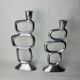 Pair of circle candlesticks by Matthew Hilton, England, 1980