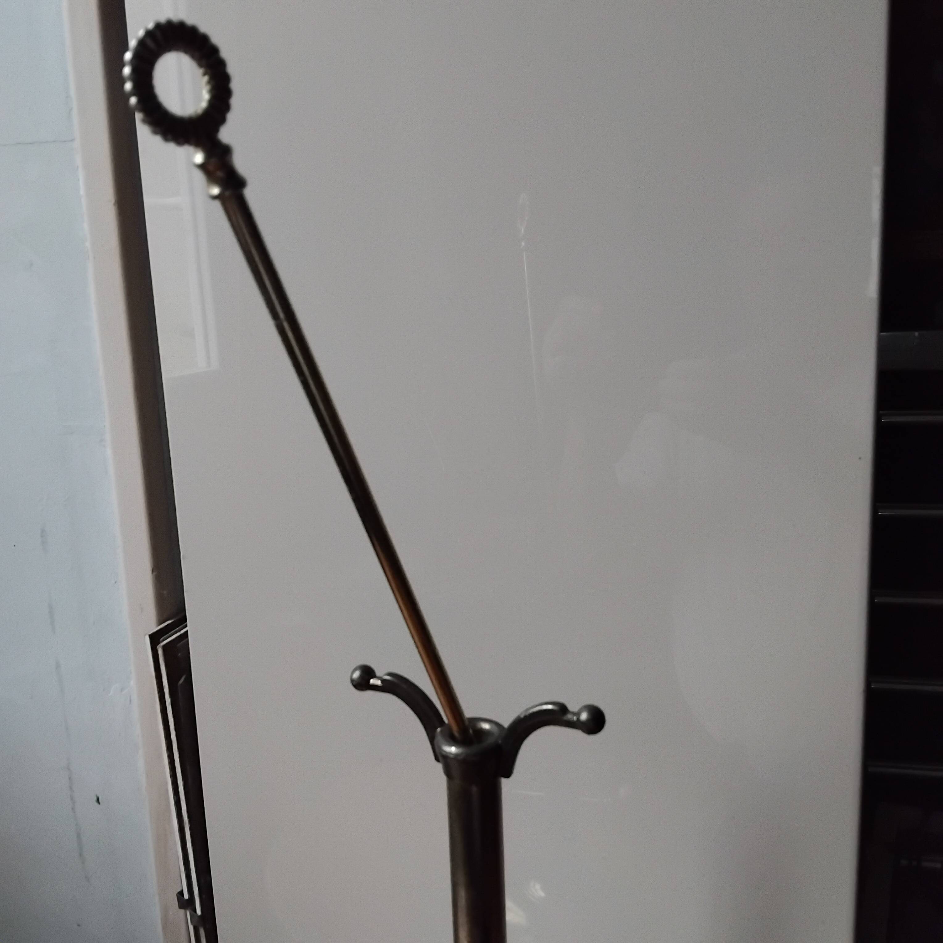 Small and discreet brass fireplace tool set.