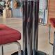 Round black smoked glass dining table + 2 terracotta chairs