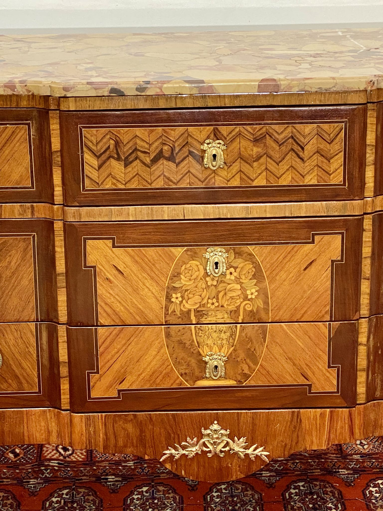Chest of drawers Transition Style Louis XV marquetry and bronze