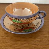 Coffee cup and under cup or tea made of iridescent Japanese porcelain