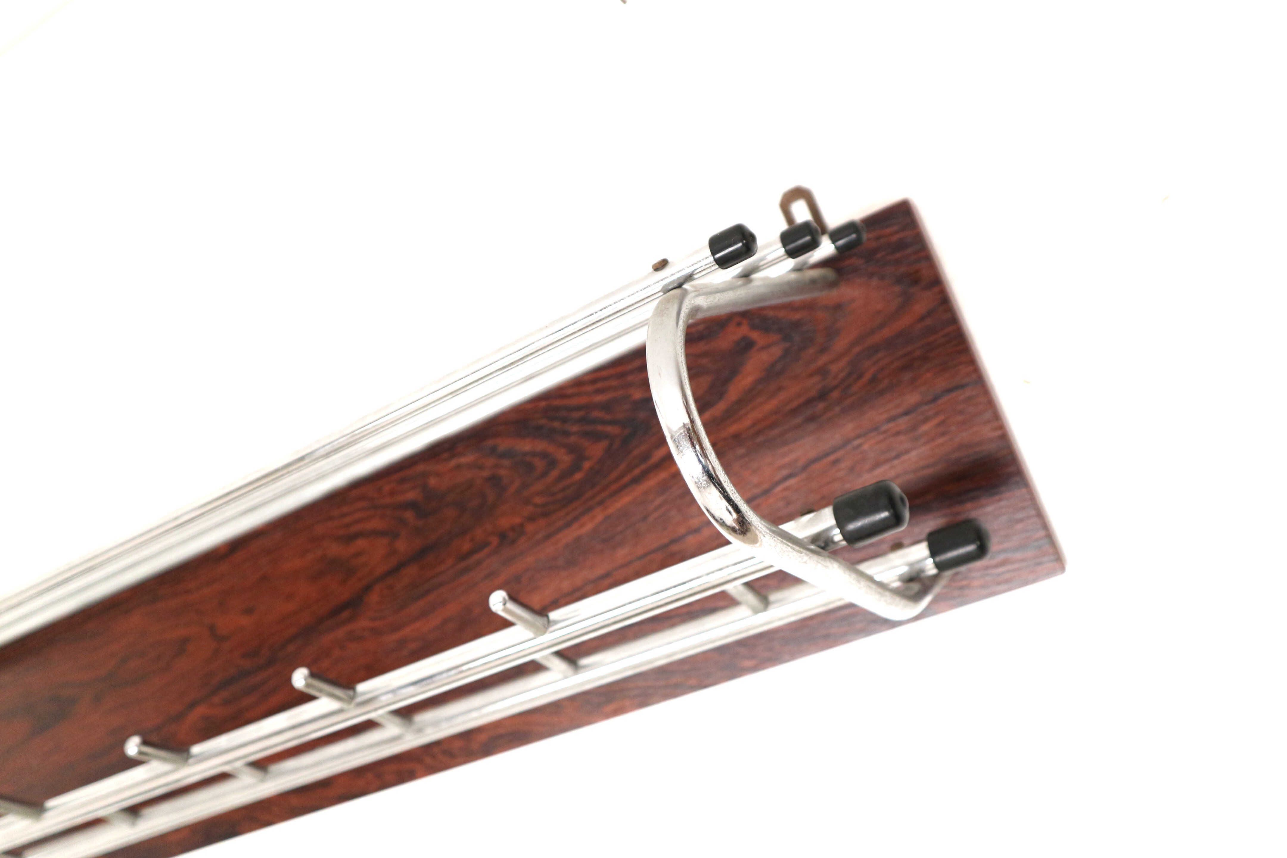 Vintage rosewood coat rack made in the 1960s