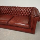 Old red leather Chesterfield sofa