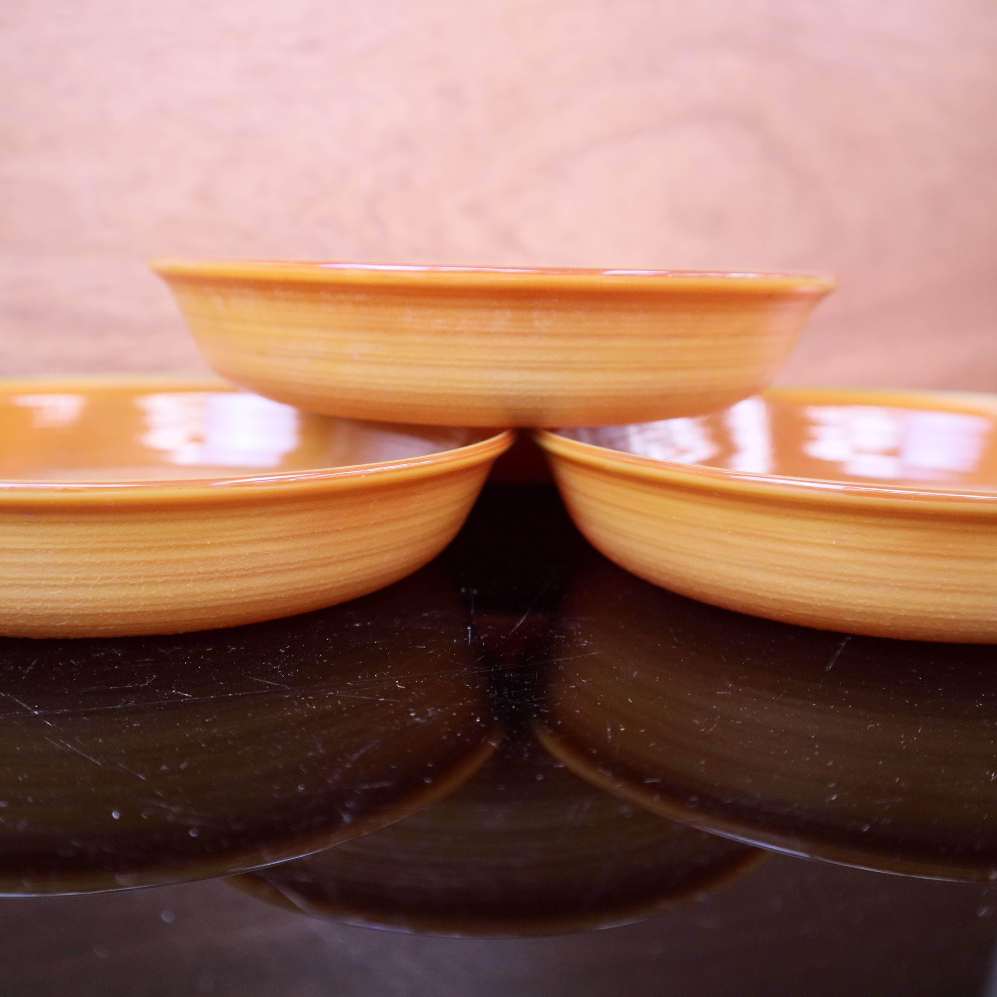 Set of 5 orange deep plates Arcopal France from the 1970s.
