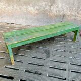 Old wooden bench sidetable green