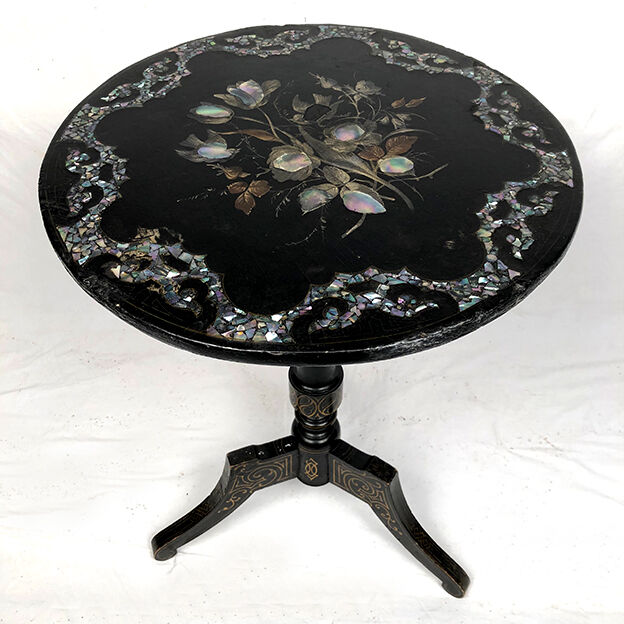 Napoleon III tipping pedestal table, blackened wood burgauté of mother-of-pearl