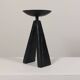 Vintage candle holder made of hand-forged metal, in a brutalist style.