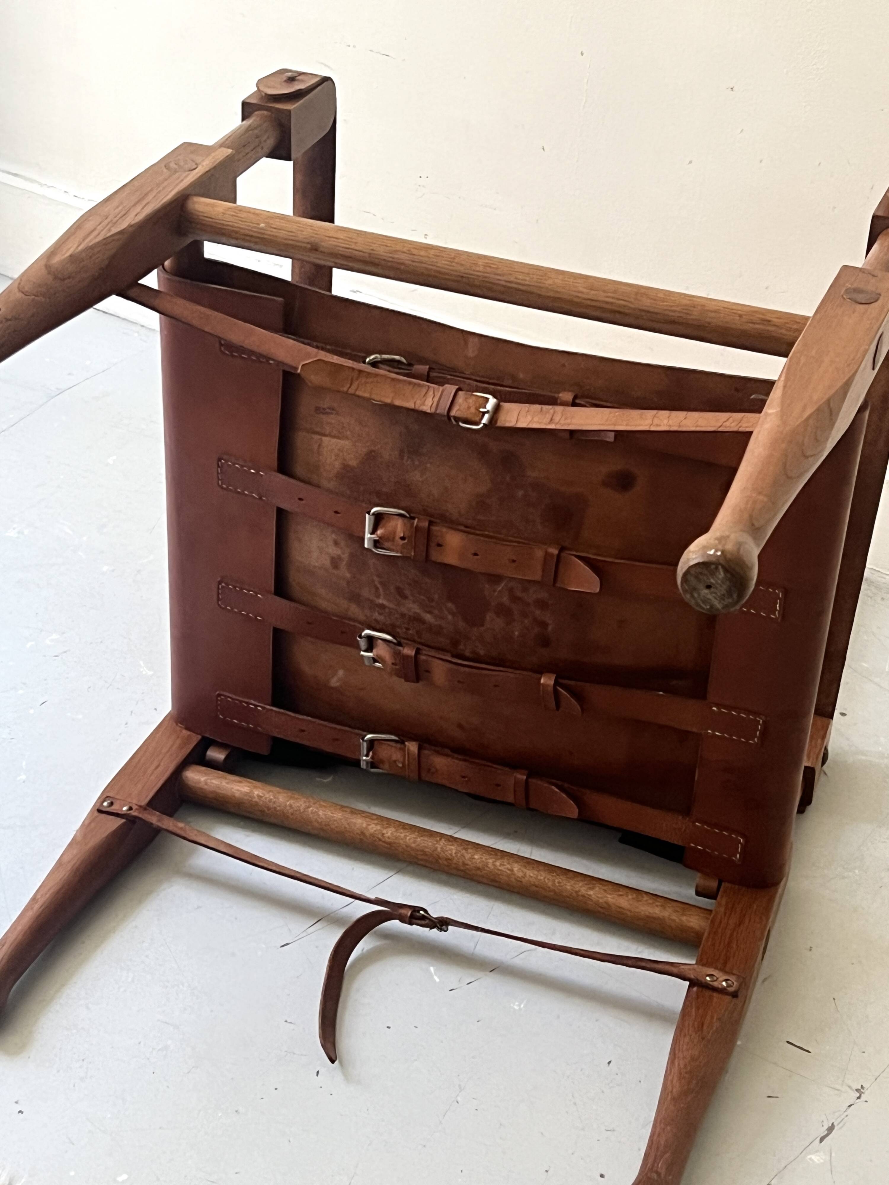 Safari armchair in wood & cognac leather by Wilhelm Kienzle for Wohnbedarf 1950