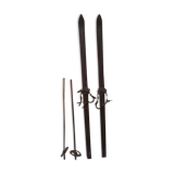 Pair of old skis with its poles