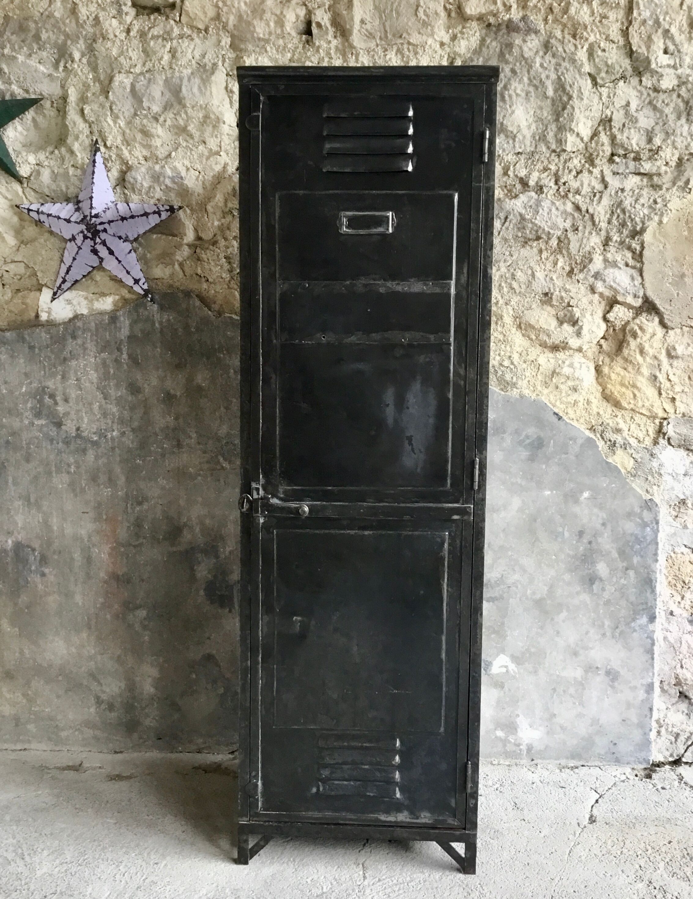 Riveted cloakroom converted into storage cabinet - early twentieth century