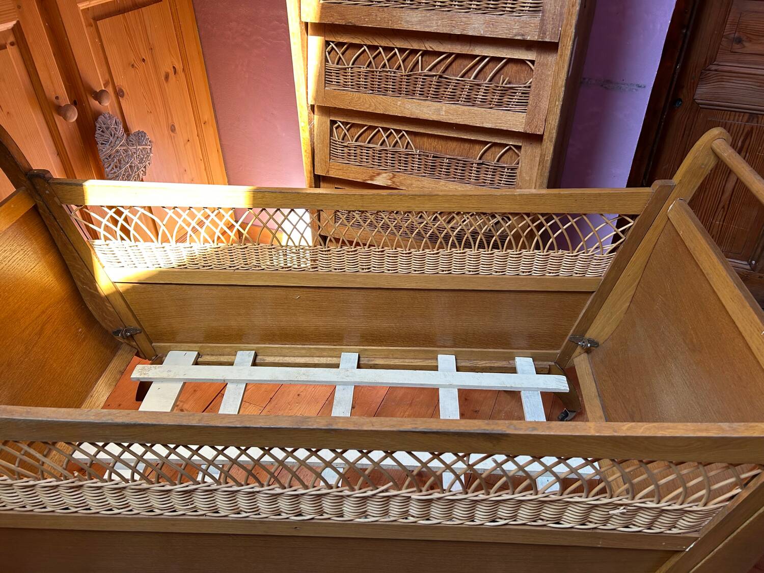 Wooden and rattan children's bed from the 60s
