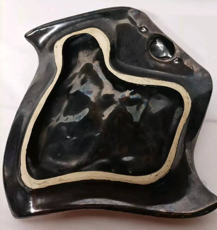 Vintage ceramic pocket emptier