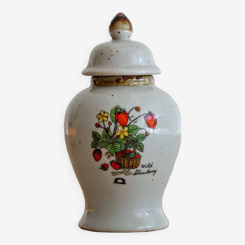 Small jam or ginger jar with strawberry decoration