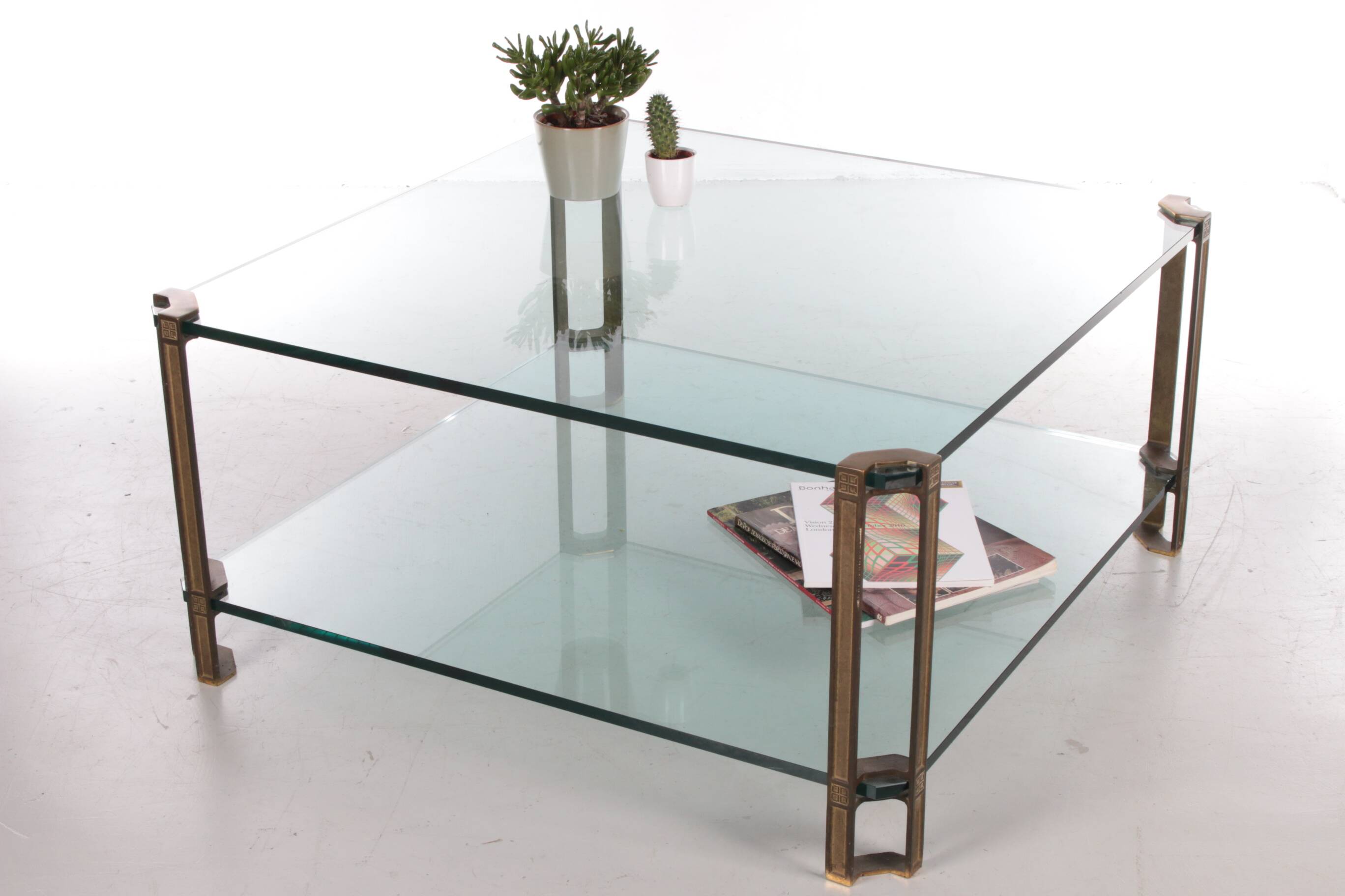 Peter Ghyczy T24D coffee table with brass legs and glass top