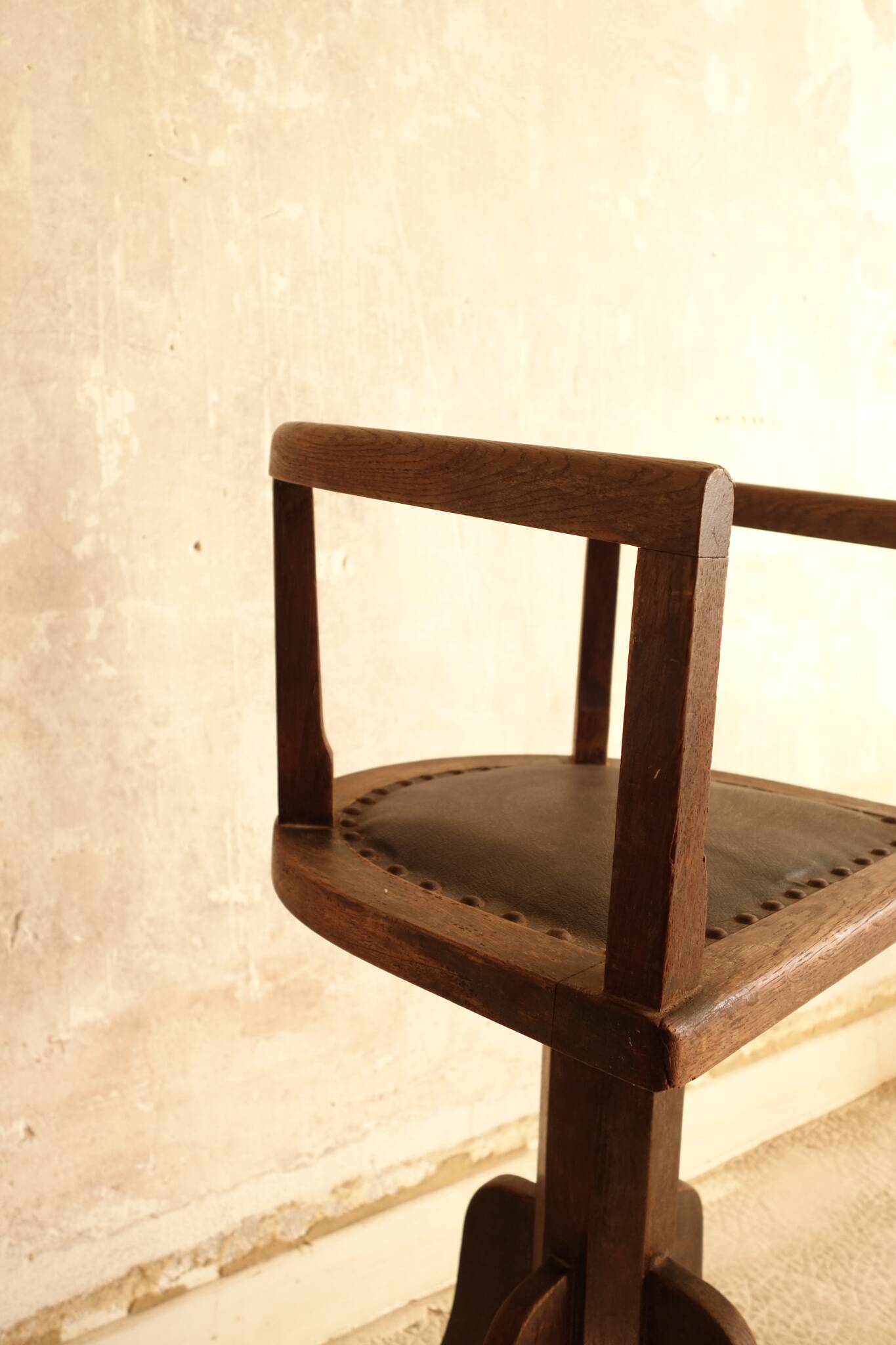 Antique wooden swivel chair