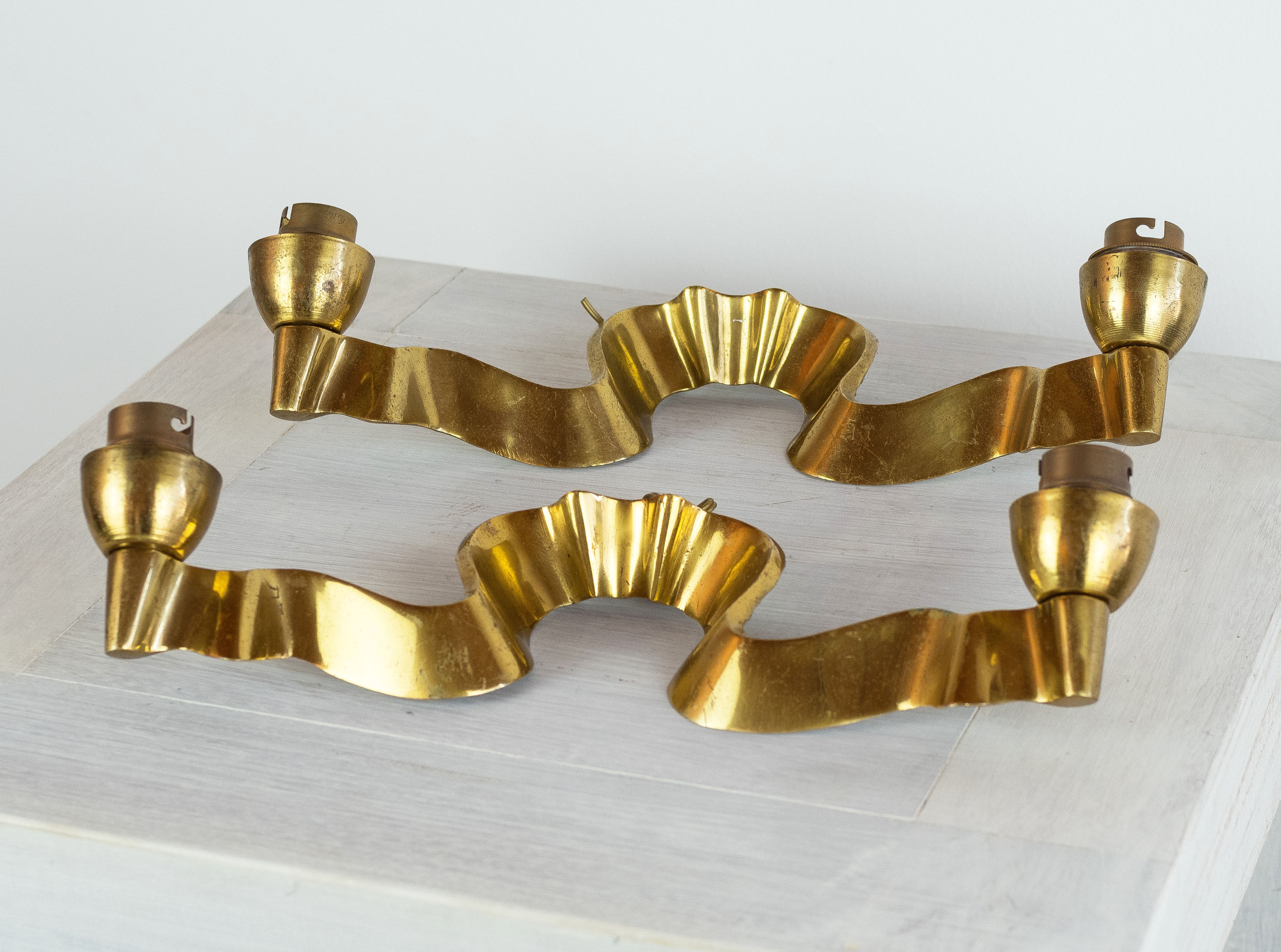 Pair of gilded bronze wall lamps, France, 1940