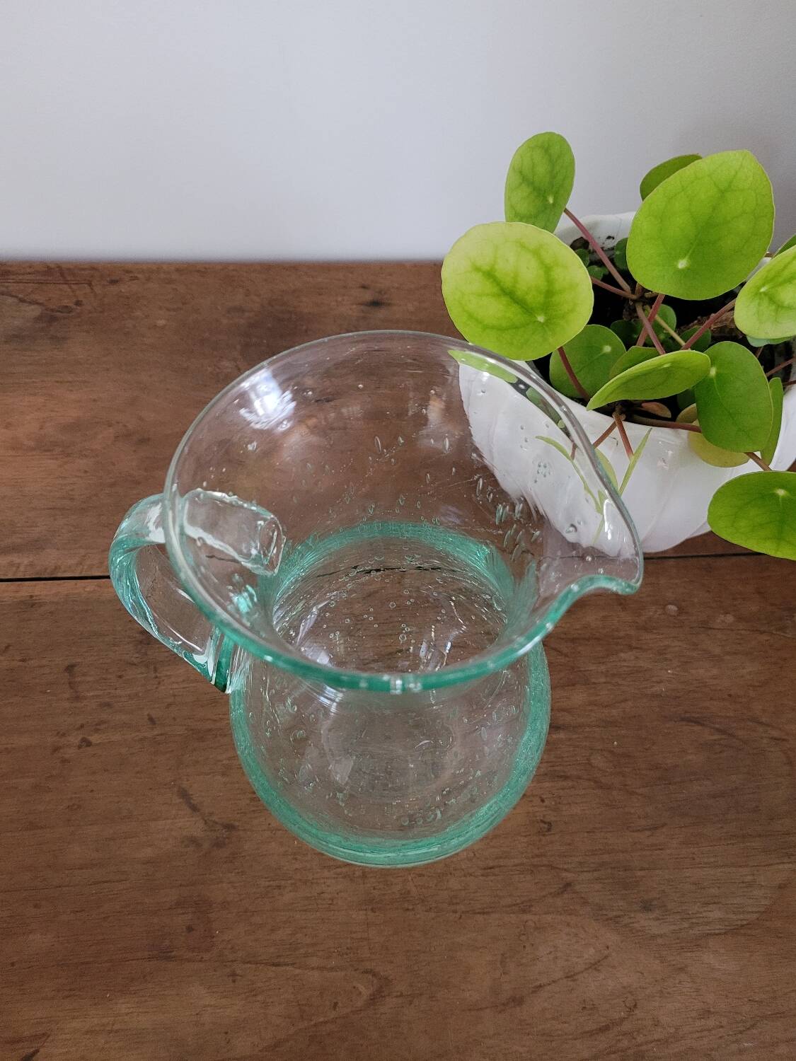 pitcher in green bubbled glass