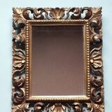Miroir en bois sculpté et doré