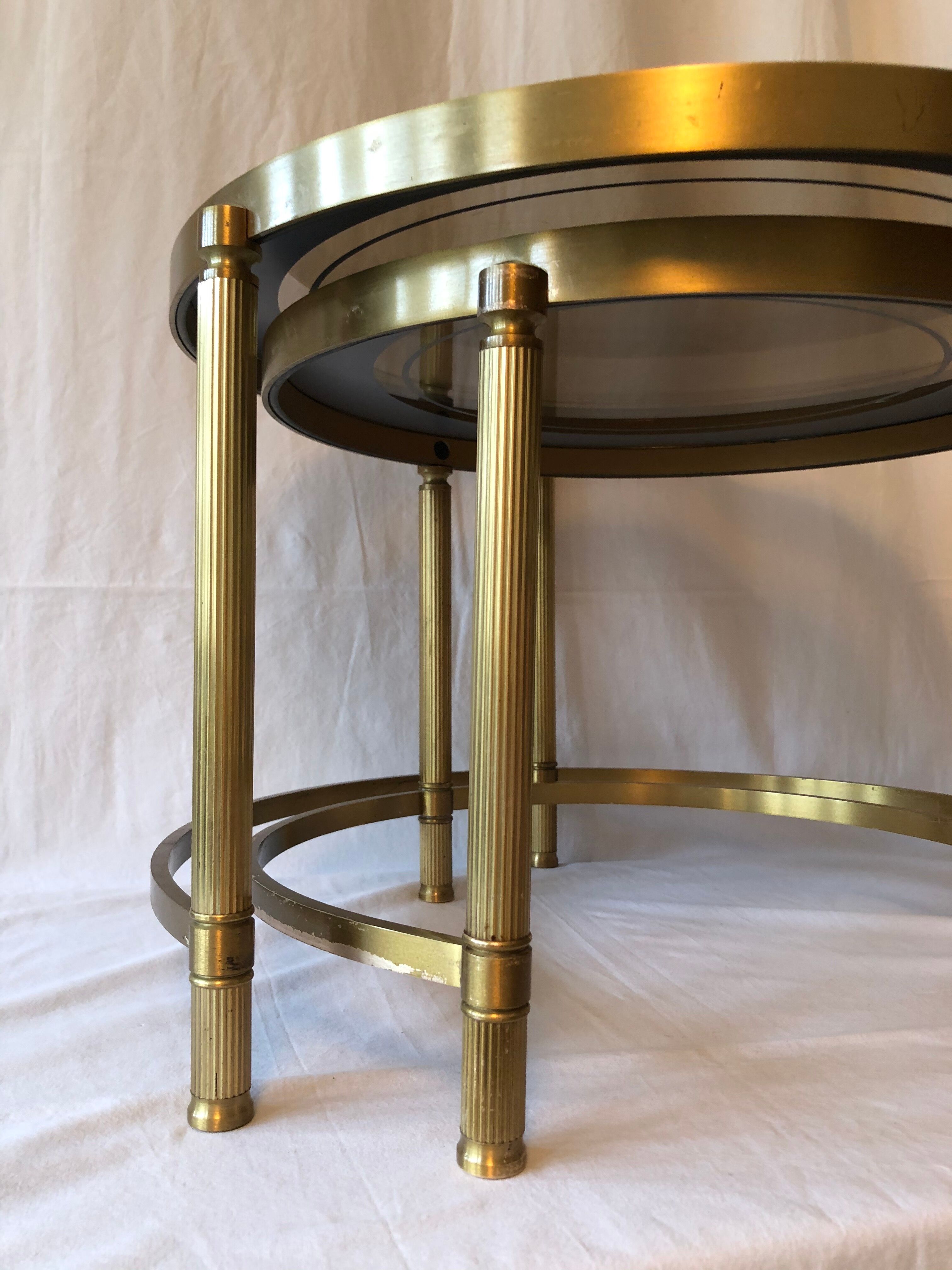 Brass nesting tables, gold smoked glass trays