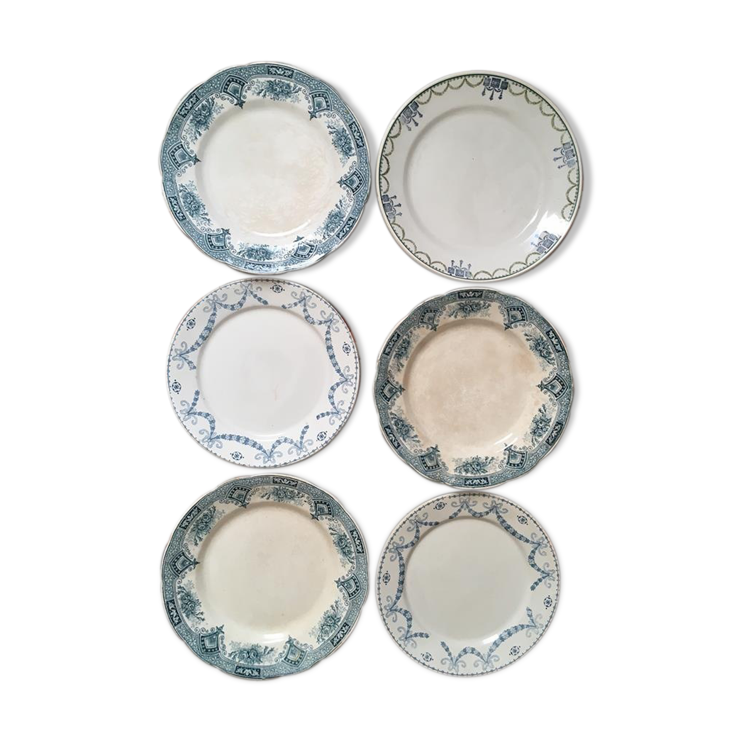 Together six dinner plates old mismatched bluish green.