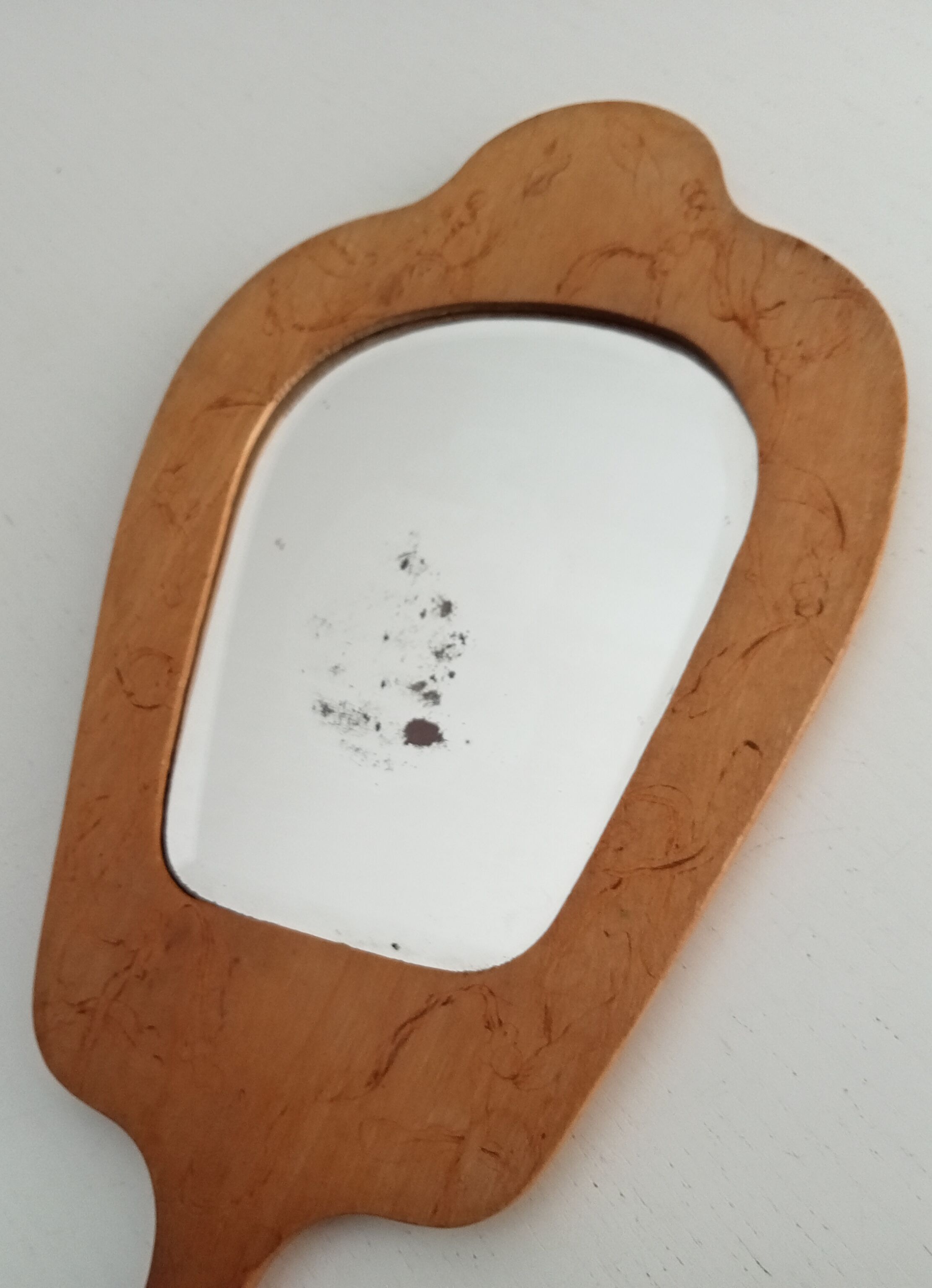 Antique beveled hand mirror