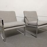 Pair of designer armchairs