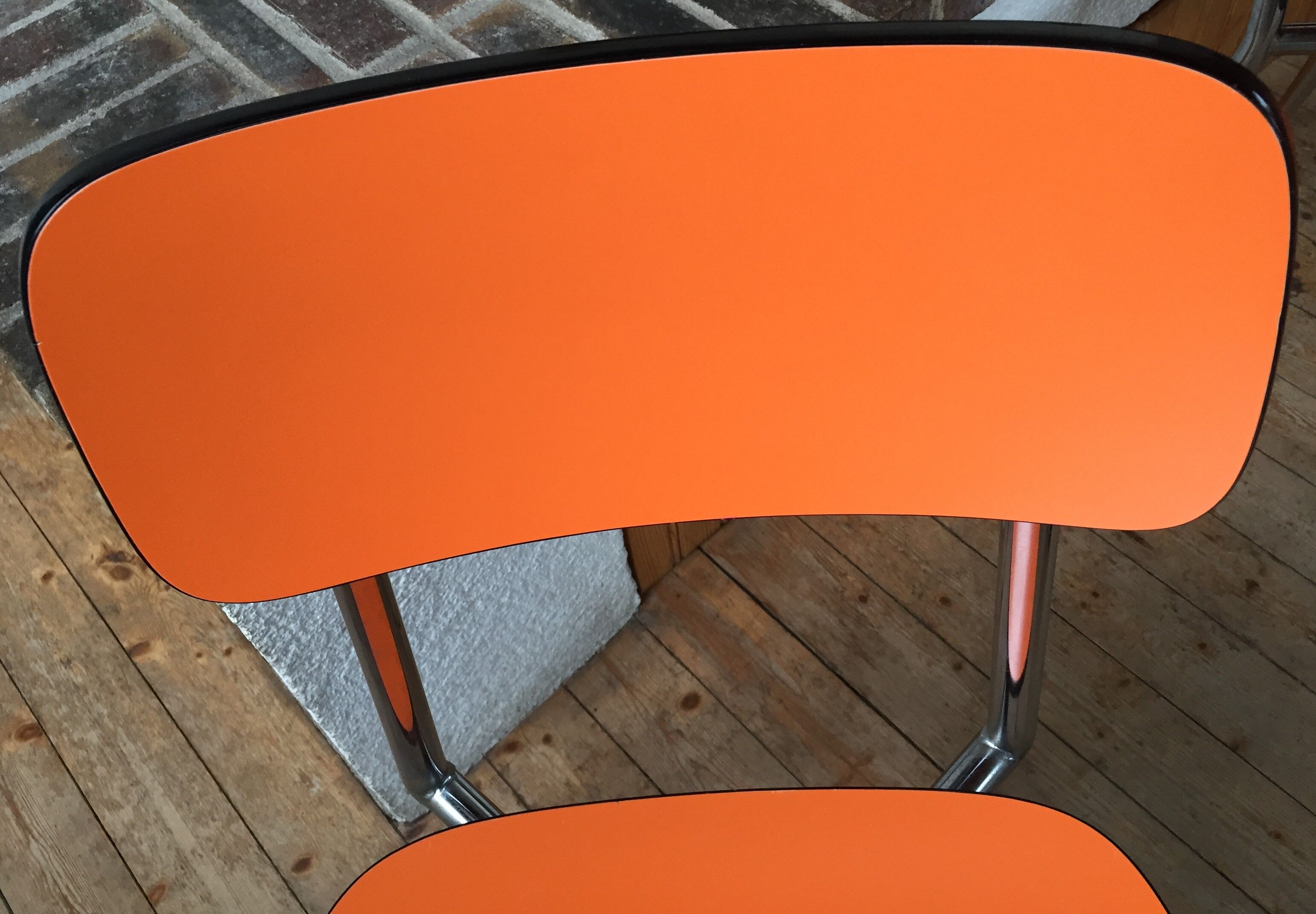 Lot of 4 vintage chairs in orange formica