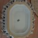 Malicorne fruit bowl in white pierced faience with monogram TE.