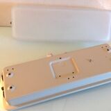 Rectangular porthole wall light in industrial/70s style frosted glass