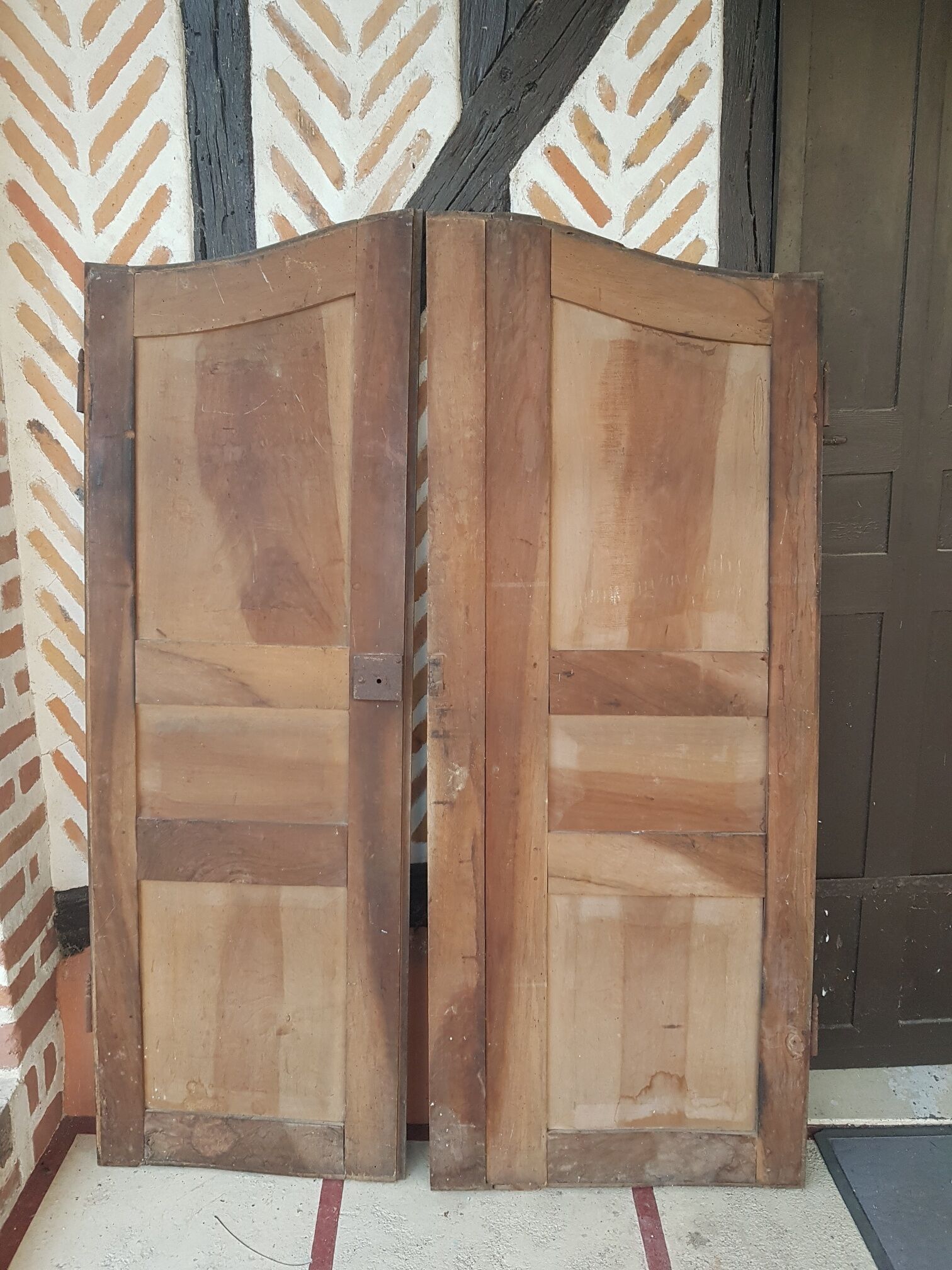 Old pair of rounded cabinet doors
