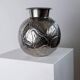 Vintage Italian vase in nickel-plated brass from the 1960s, hand-hammered relief of fruits and leaves.